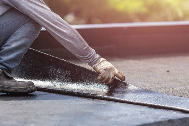 Professional Interior Drainage System technician working in Amityville, NY